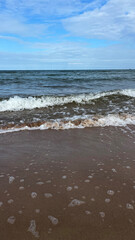 Waves rolling on the Baltic Sea coast. Seascape. Latvia