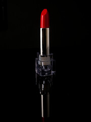 Beautiful lipsticks on black background