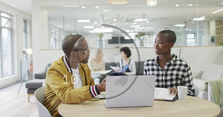 Image of data processing over diverse business people in office