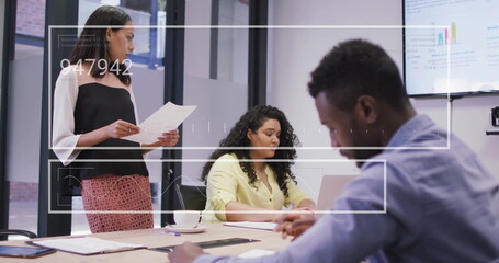 Image of data processing over diverse business people in office