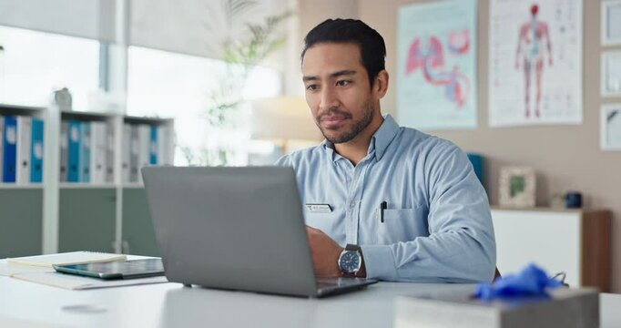 Doctor, laptop and video call in office for healthcare diagnosis, patient and wellness consulting. Asian man, tech and telehealth as gp for treatment plan, eprescription and medical advice with wave