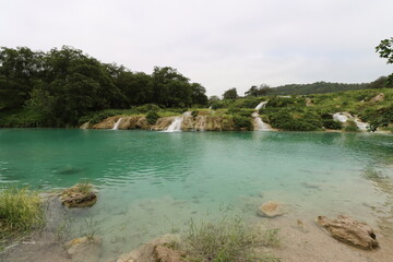 Small waterfalls of Wadi Darbat in Salalah, Sultanate of Oman with lake