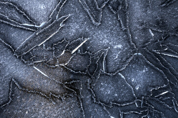 Ice texture. Sun rays on ice. Silver ice texture.