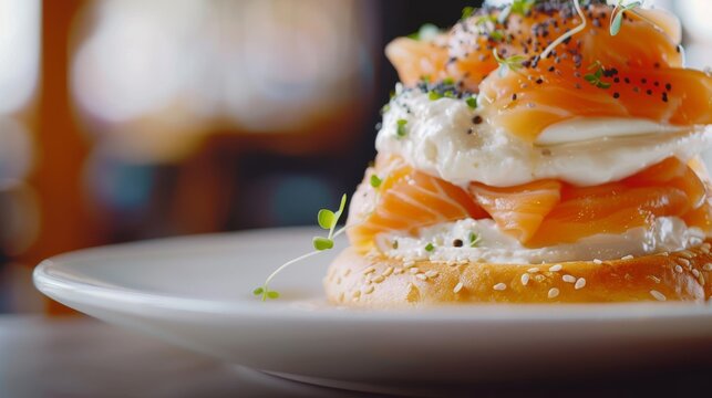 A close-up shot of a gourmet bagel topped with smoked salmon, cream cheese, and microgreens, highlighting its fresh, intricate details.