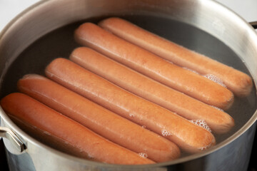 Homemade Boiled Hot Dogs in Water. Close-up.
