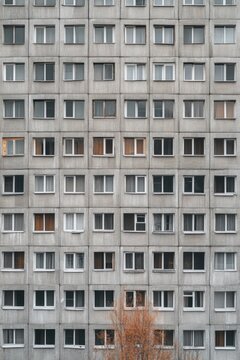 Facade of a Grey Multi-storey Panel building in Russia, Soviet architecture houses