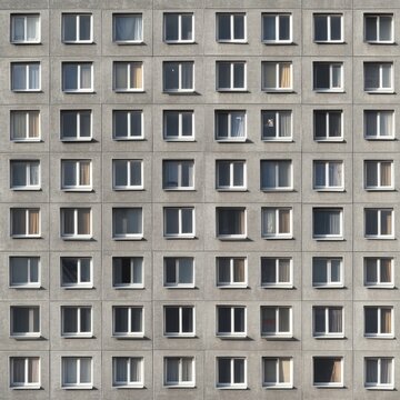 Facade of a Grey Multi-storey Panel building in Russia, Soviet architecture houses