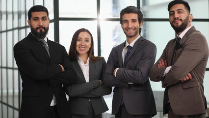 succesful business team smiling teamwork corporate office colleague