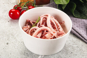Marinated squid tentacles in the bowl