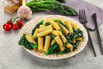 Italian cuisine - tortiglioni with spinach