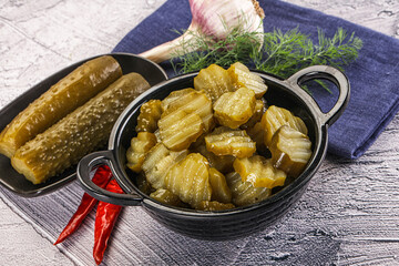 Sliced marinated cucumbers in the bowl