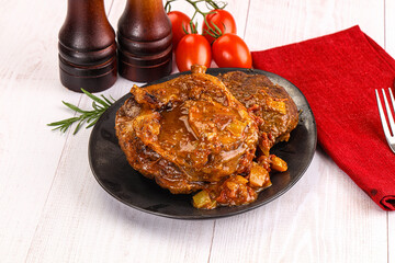 Italian cuisine - ossobuco with sauce