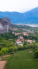 Scenic view of steep rock formation pinnacles seen from Monastery of St Nicholas Anapafsas. Cloudy day in Kastraki,