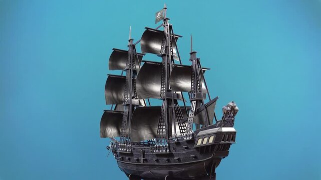 Puzzle Blackbeard's Ship Queen Anne's Revenge on a Black Background.