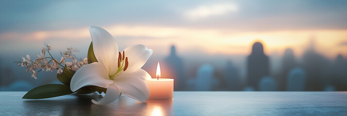 A white lily rests beside a glowing candle, with faint tombstones in the background, symbolizing purity, peace, and quiet remembrance for All Saints' Day.