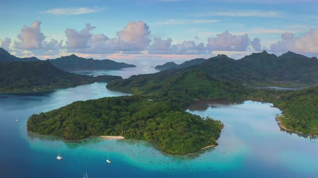 Peaceful sailboats anchored near archipelago islands turquoise waters, French Polynesia. Perfect relaxing vacation. Aerial drone footage. Remote wild nature paradise, exotic summer luxury yacht travel