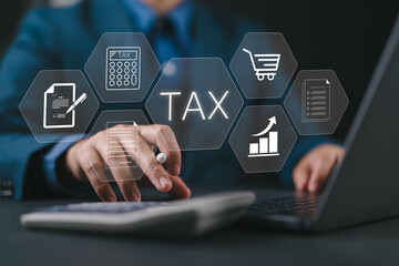 Tax and Vat concept. Government, state taxes concept. Businessman using calculator and laptop to complete Individual income tax return form online for tax payment. Data analysis, financial research.