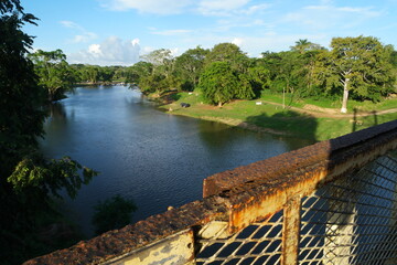 Exploring the lush landscapes of San Ignacio, Belize, with a view of the river and surrounding nature during daylight