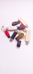 Several types and shapes of a flash disk on a white background