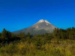 a very majestic mountain, sturdy and active with a very neutral area at the foot of the mountain in an area of ​​Magelang called Mount Merapi