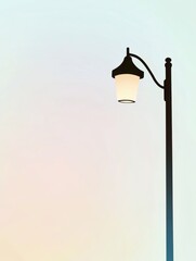 Elegant Street Lamp Against Soft Gradient Sky