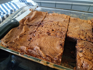 Freshly Baked Brownies in a Baking Dish in the Kitchen