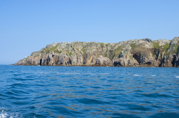 Shoreline of 'Lundy Island' in the Bristol Channel on tranquil day