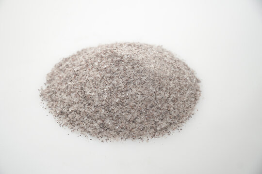 Aromatic heap of Damar Mata Kucing (Shorea Javanica) resin gum sand, also known as Dammar gum, isolated on a clean white background.