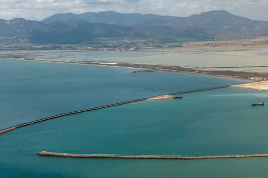 Aerial view of beaches, ponds and salt pans around Cagliari, Italy, Giorgino area