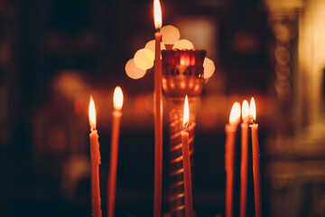 burning candles in church