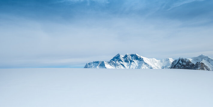 Mount Everest, Nuptse, Lhotse with South Face wall beautiful panoramic shot of a High Himalayas from Mera peak slope snow fields at cca 6000m. Beauty in Nature and extreme sports concept image.