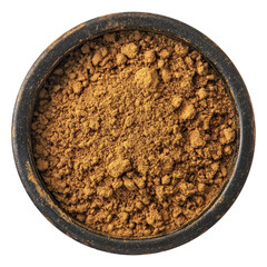 Ground nutmeg powder in a bowl with whole nutmegs.