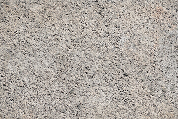 A high-resolution image showcasing the texture of rough concrete, ideal for backgrounds or design elements.