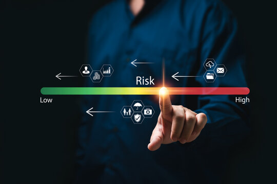 Risk management and reduction concept, Businessman touch on level bar adjust risk assessment to low-level, Business, Financial, Insurance, Healthcare,  Management control, and strategy, Measure