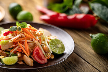 Somtam Thai, a popular Thai dish that uses papaya as an ingredient.