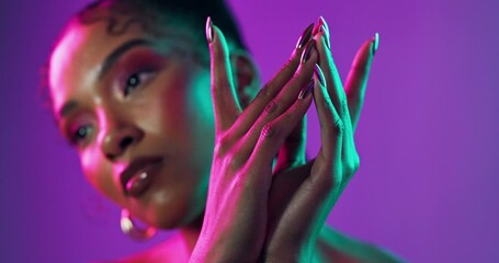 Woman, hands and manicure for beauty on neon background, glamour makeup and aesthetic glow of salon. Female person, pride wand cosmetics for creative nails, jewellery and unique hairstyle of wellness