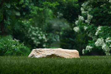 Stone podium tabletop floor in outdoors tropical garden forest blurred green leaf plant nature background.Natural product placement pedestal stand display,jungle paradise concept.