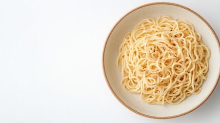 Simple spaghetti in ceramic bowl on white background