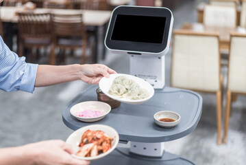 Human Interaction with Serving Robot in a Korean Restaurant