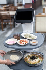 Human Interaction with Serving Robot in a Korean Restaurant