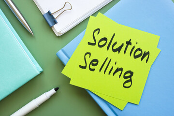 Sticker with the phrase solution selling. Represents effective sales techniques.