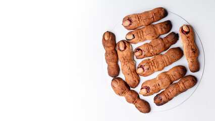  Halloween menu: Homemade witch finger cookies with almond nail decorations. banner, place for text