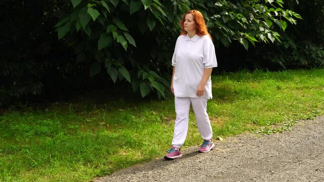 Senior woman walks relaxing outdoor