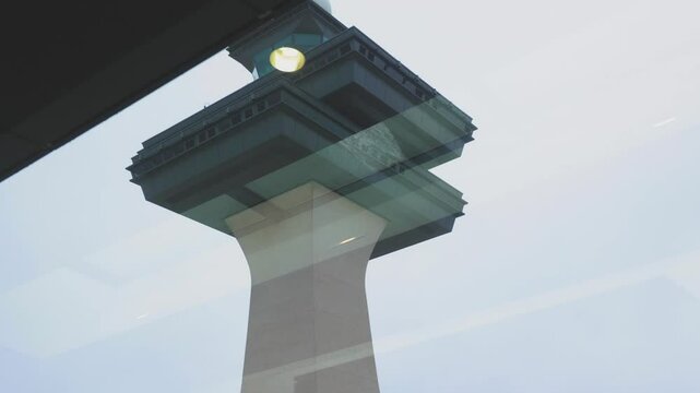 Airport control tower. Upward perspective through large windows