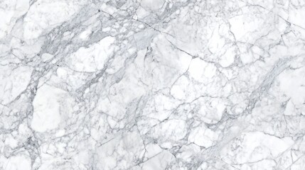 Close-up top view of classic Carrara marble, with soft grey veins running through a white background
