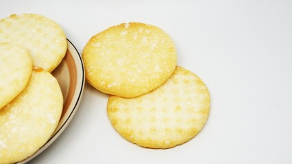 Rice crackers are a crunchy, savory food with added caramel to give it a sweet taste.
