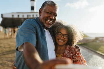 Happy senior couple enjoying retirement and vitality in a beautiful outdoor setting