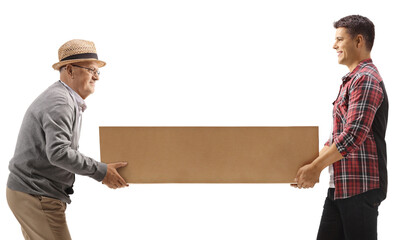 Young and older man carrying a cardboard box