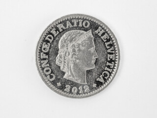 Close-up of a swiss ten cents coin, white background, back side