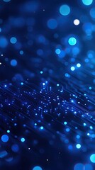 A captivating blue abstract background featuring shimmering particles and light effects, perfect for digital and artistic projects.